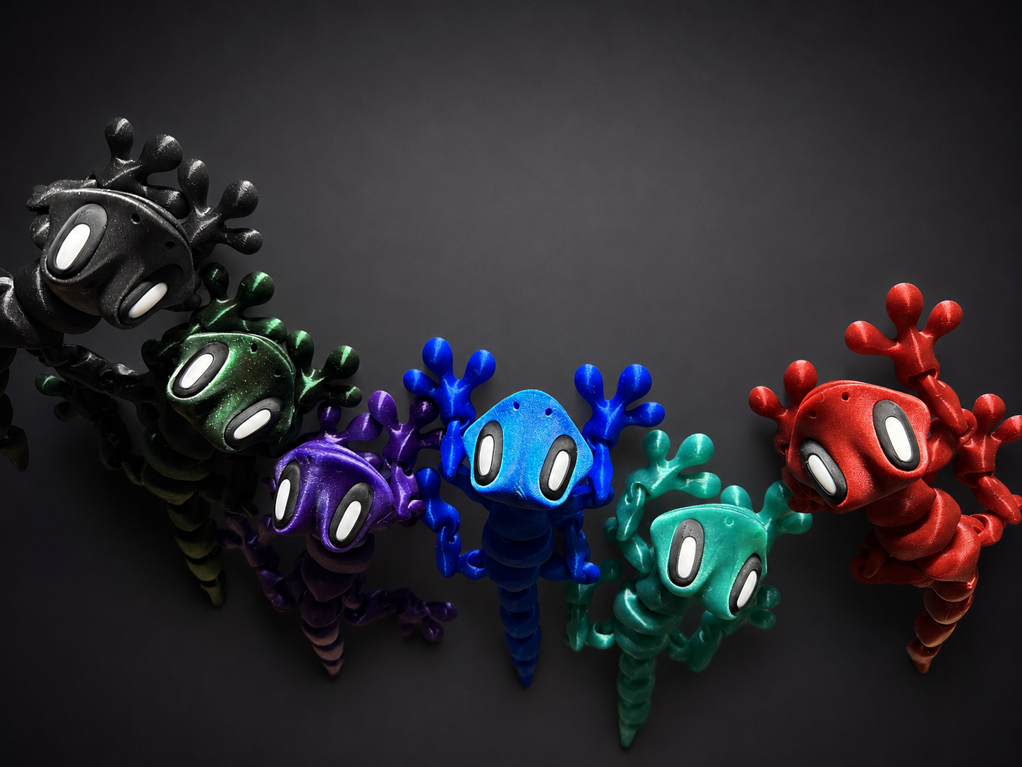 A colorful group of Gecko Kritters posed together